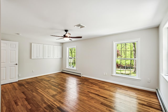 138 Flood Rd, Marlborough, CT 06447 - empty room with a baseboard heating unit, baseboard heating, hardwood / wood-style floors, and a ceiling fan