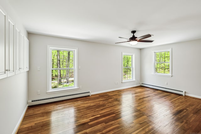 138 Flood Rd, Marlborough, CT 06447 - unfurnished room with baseboard heating, hardwood / wood-style floors, ceiling fan, and baseboards