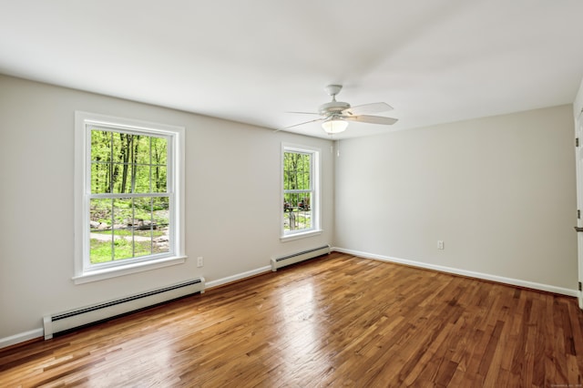 138 Flood Rd, Marlborough, CT 06447 - unfurnished room featuring a baseboard radiator, wood finished floors, and ceiling fan