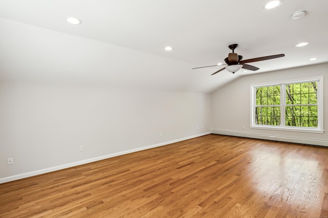 138 Flood Rd, Marlborough, CT 06447 - additional living space with a baseboard radiator, ceiling fan, light wood-style flooring, recessed lighting, and lofted ceiling