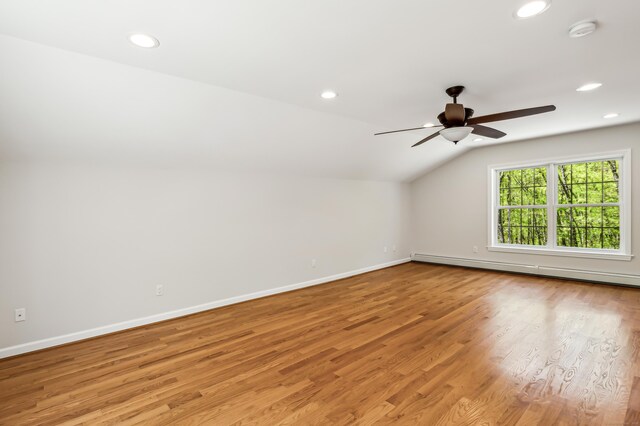 138 Flood Rd, Marlborough, CT 06447 - bonus room featuring a baseboard radiator, ceiling fan, light wood-style floors, baseboards, and recessed lighting