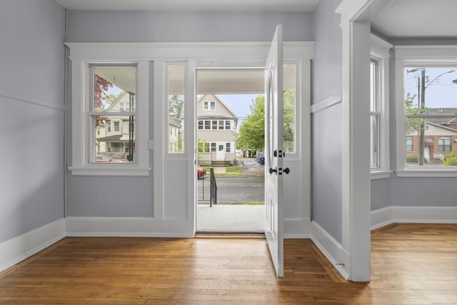 669 Third Ave, West Haven, CT 06516 - entrance foyer with hardwood / wood-style floors, healthy amount of natural light, and baseboards