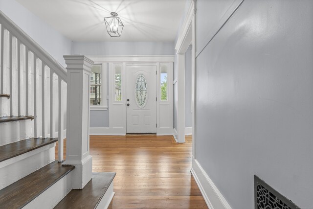 669 Third Ave, West Haven, CT 06516 - foyer entrance featuring light wood-style flooring, stairs, and baseboards