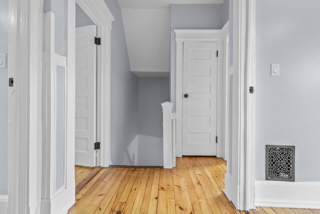 669 Third Ave, West Haven, CT 06516 - corridor featuring an upstairs landing and light wood-style floors