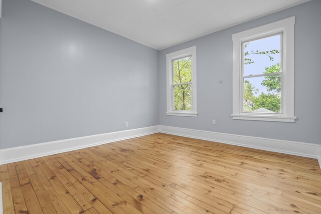 669 Third Ave, West Haven, CT 06516 - spare room with light wood-type flooring and baseboards