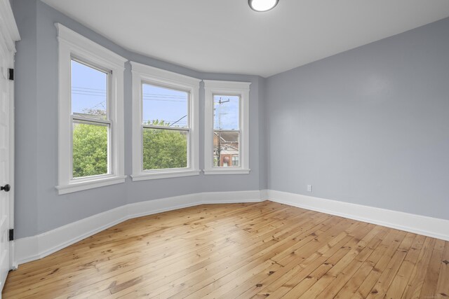 669 Third Ave, West Haven, CT 06516 - unfurnished room with light wood-style flooring and baseboards