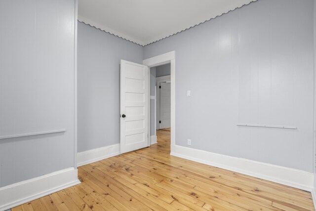 669 Third Ave, West Haven, CT 06516 - spare room featuring wood-type flooring and baseboards