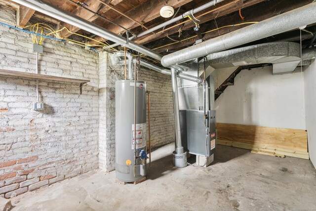 669 Third Ave, West Haven, CT 06516 - unfinished basement with gas water heater and heating unit