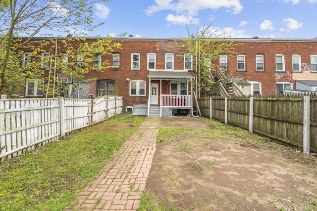 669 Third Ave, West Haven, CT 06516 - back of house with fence and brick siding