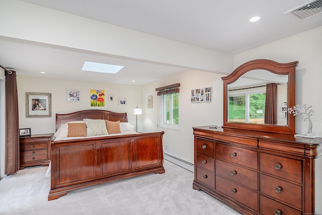 bedroom with a skylight, a baseboard radiator, light carpet, and recessed lighting