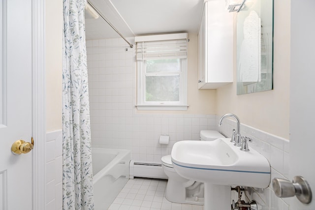 bathroom featuring baseboard heating, tile walls, tile patterned flooring, toilet, and shower / bath combo