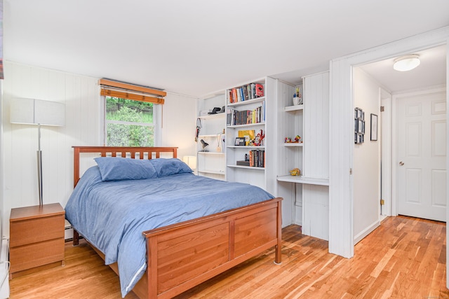 bedroom with light wood-style flooring