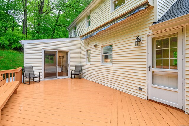 deck with view of wooded area