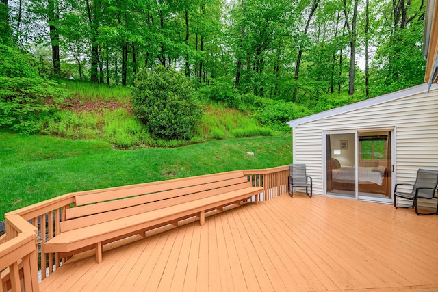 wooden terrace with a yard
