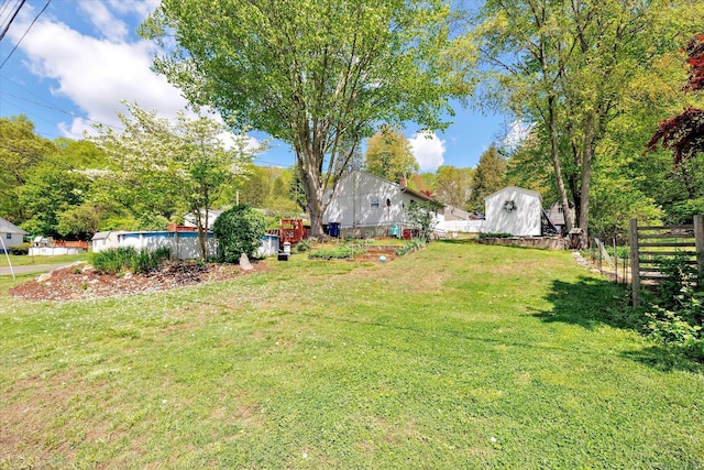 2 Chestnut Ct, Seymour, CT 06483 - view of yard with a storage unit, an outdoor structure, and an outdoor pool