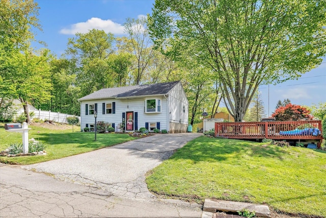 2 Chestnut Ct, Seymour, CT 06483 - bi-level home featuring a deck and asphalt driveway