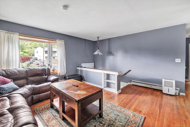 2 Chestnut Ct, Seymour, CT 06483 - living room featuring baseboard heating, wood finished floors, and baseboards