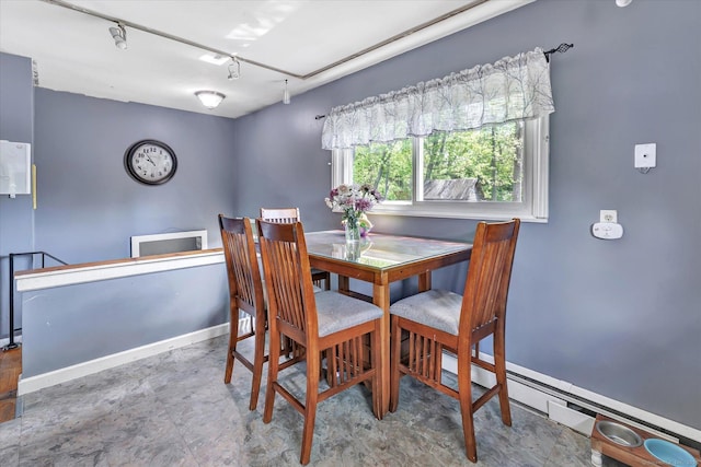 2 Chestnut Ct, Seymour, CT 06483 - dining space featuring baseboards and a baseboard heating unit