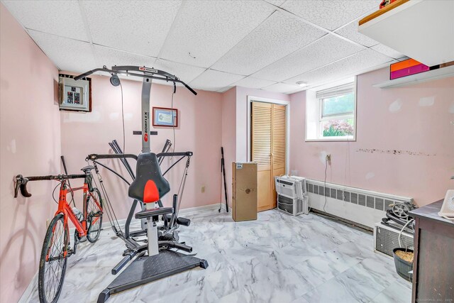 2 Chestnut Ct, Seymour, CT 06483 - exercise room with radiator heating unit, a drop ceiling, and marble finish flooring