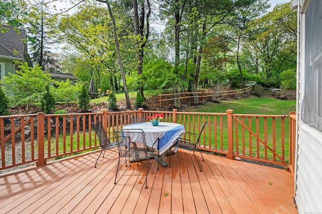 14 Arnold Ln, Norwalk, CT 06853 - wooden terrace featuring outdoor dining space, a yard, and view of wooded area