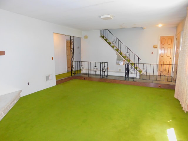 29 Barholm Ave, Stamford, CT 06907 - unfurnished living room featuring carpet flooring and a baseboard radiator