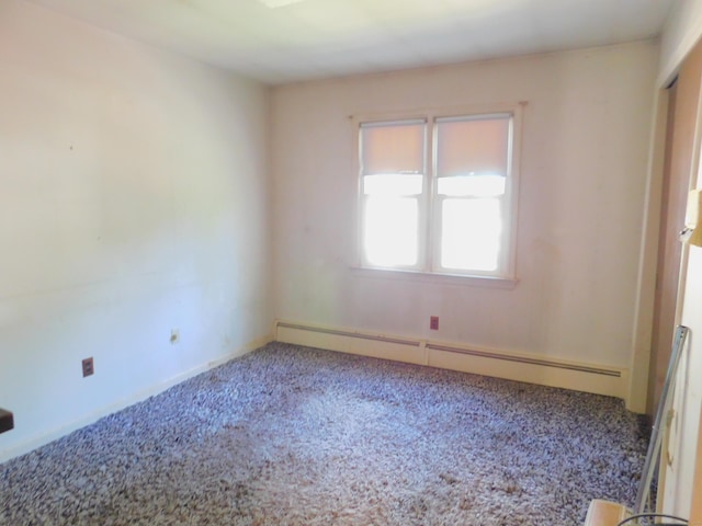 29 Barholm Ave, Stamford, CT 06907 - carpeted empty room featuring a baseboard heating unit and baseboards