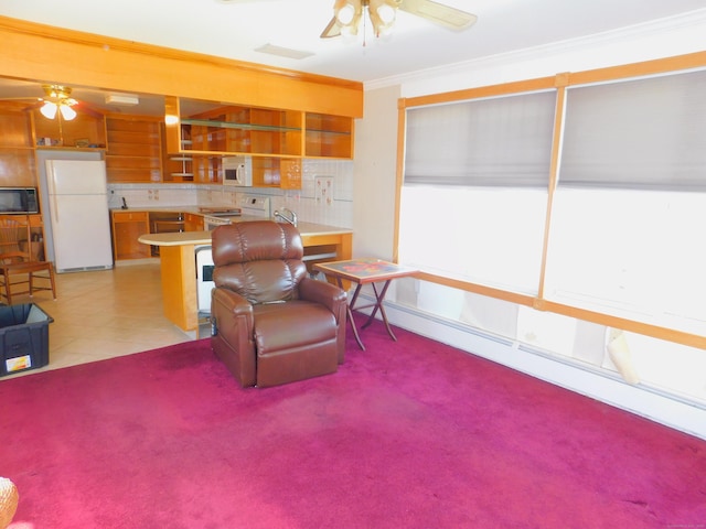 29 Barholm Ave, Stamford, CT 06907 - living room featuring ceiling fan, baseboard heating, ornamental molding, and light carpet