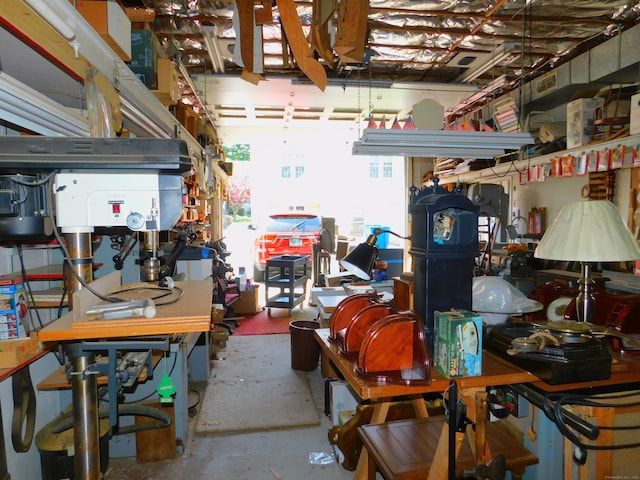29 Barholm Ave, Stamford, CT 06907 - misc room with unfinished concrete flooring and a workshop area