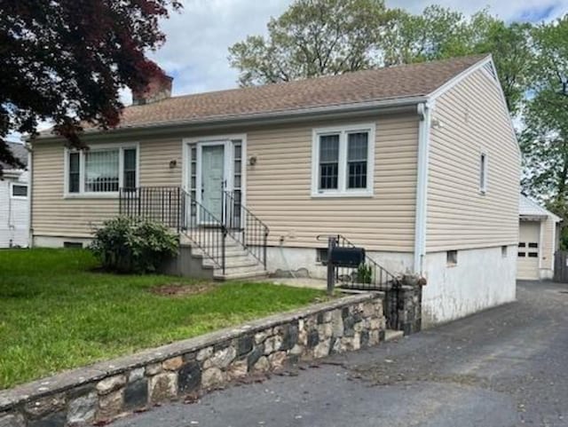 29 Barholm Ave, Stamford, CT 06907 - ranch-style house with a front yard, a chimney, and an outbuilding