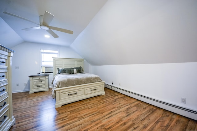bedroom featuring baseboard heating, wood finished floors, lofted ceiling, ceiling fan, and cooling unit