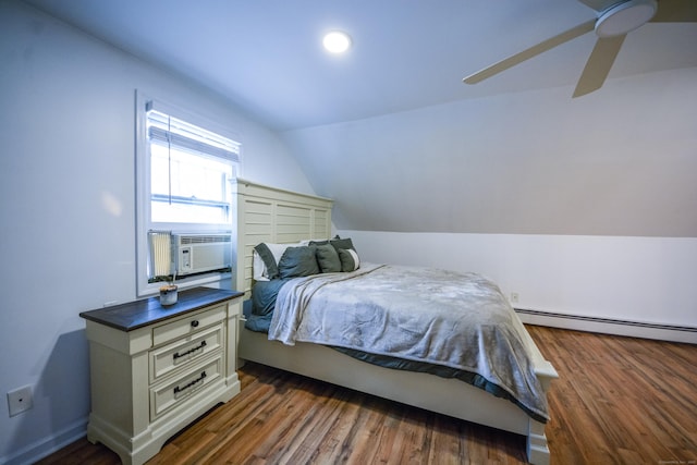 bedroom with lofted ceiling, baseboard heating, cooling unit, dark wood-style flooring, and baseboards