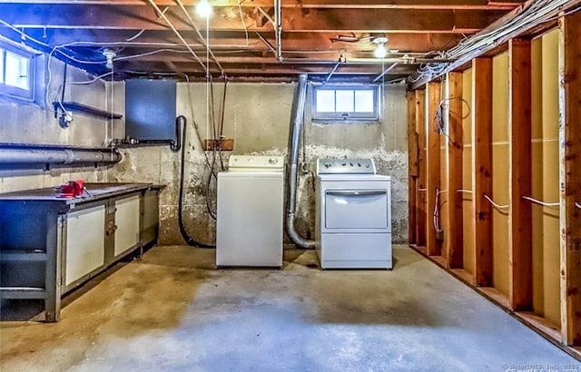 basement with washing machine and clothes dryer