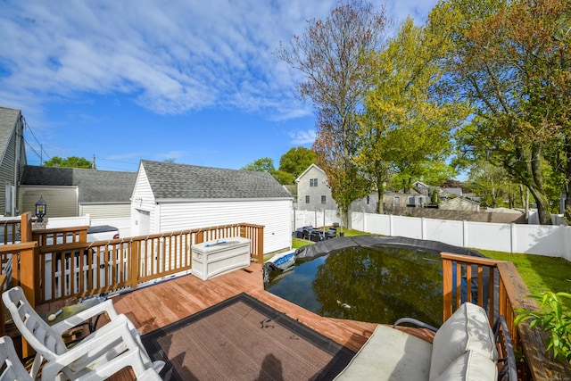 deck with a fenced backyard