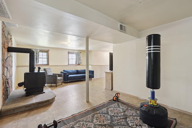 below grade area featuring a wood stove
