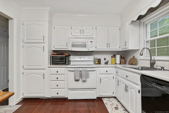 9 Cindy Ln, Norwalk, CT 06851 - kitchen featuring white appliances, a sink, dark wood-type flooring, decorative backsplash, and ornamental molding