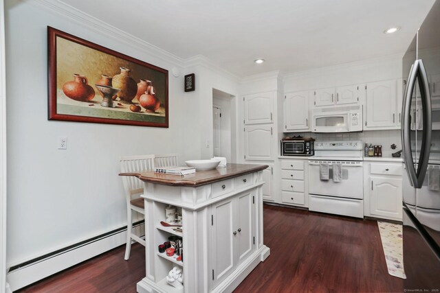 9 Cindy Ln, Norwalk, CT 06851 - kitchen with white appliances, a baseboard radiator, dark wood finished floors, white cabinetry, and ornamental molding