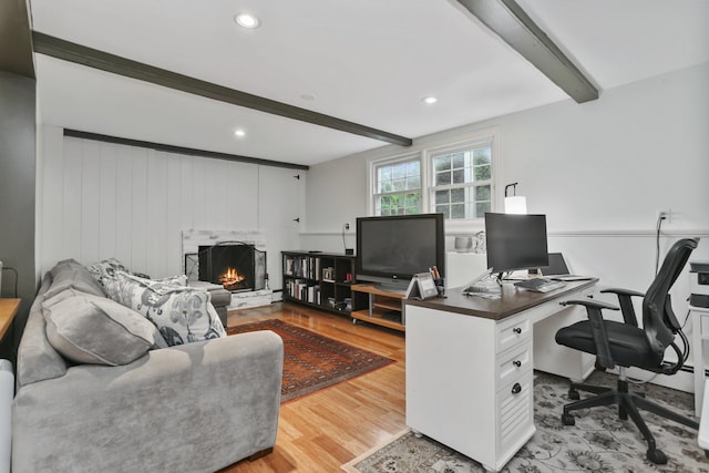 9 Cindy Ln, Norwalk, CT 06851 - office featuring beamed ceiling, wood finished floors, a warm lit fireplace, and recessed lighting