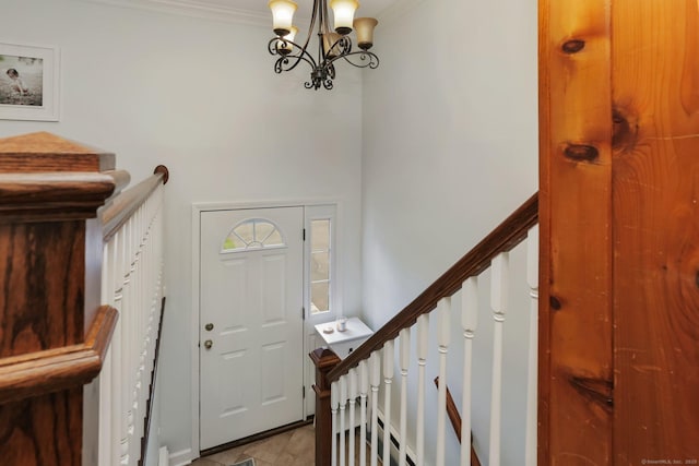 9 Cindy Ln, Norwalk, CT 06851 - foyer entrance featuring crown molding, a chandelier, and stairway