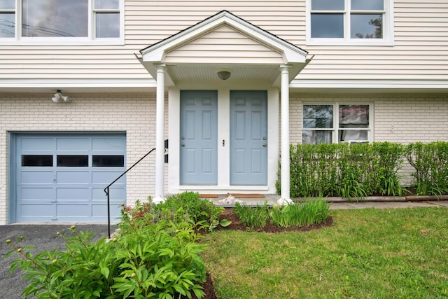 72 Locust Ave, New Canaan, CT 06840 - property entrance with brick siding and a garage