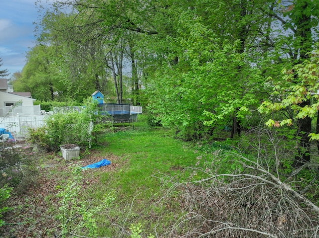 view of yard with fence