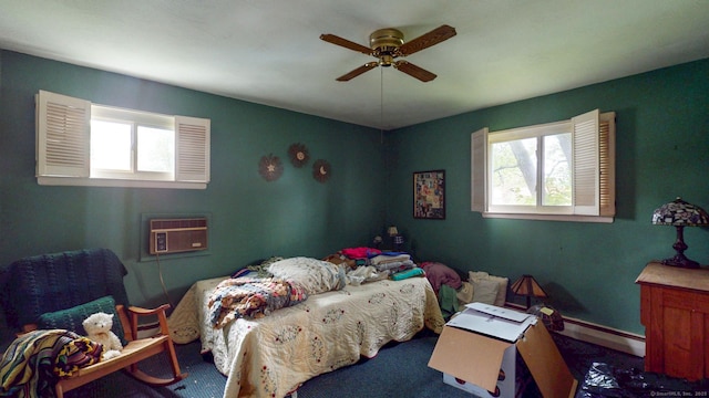 bedroom featuring an AC wall unit, ceiling fan, and carpet floors