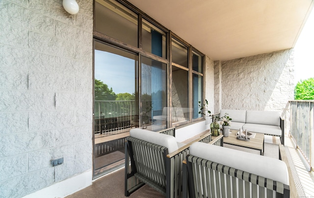 balcony with an outdoor hangout area