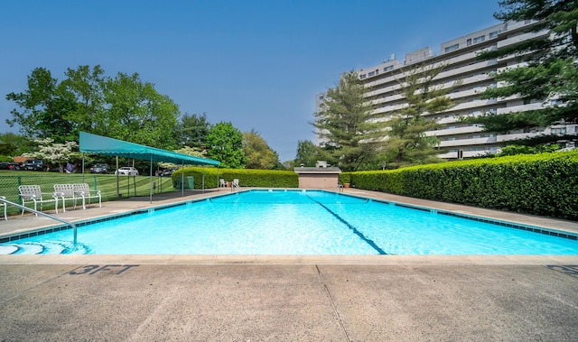 community pool with fence