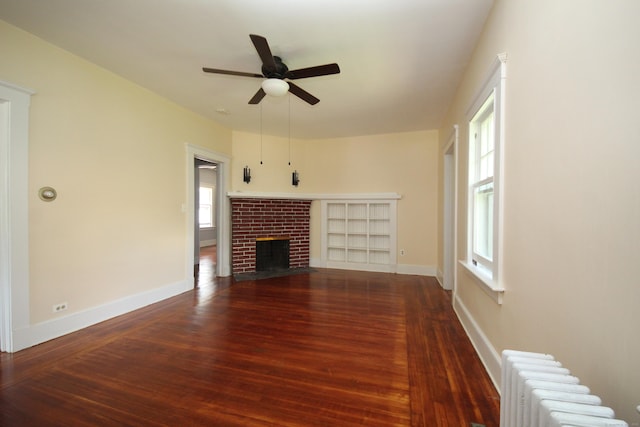 27 Ann St, West Haven, CT 06516 - unfurnished living room with radiator heating unit, a ceiling fan, healthy amount of natural light, and wood finished floors