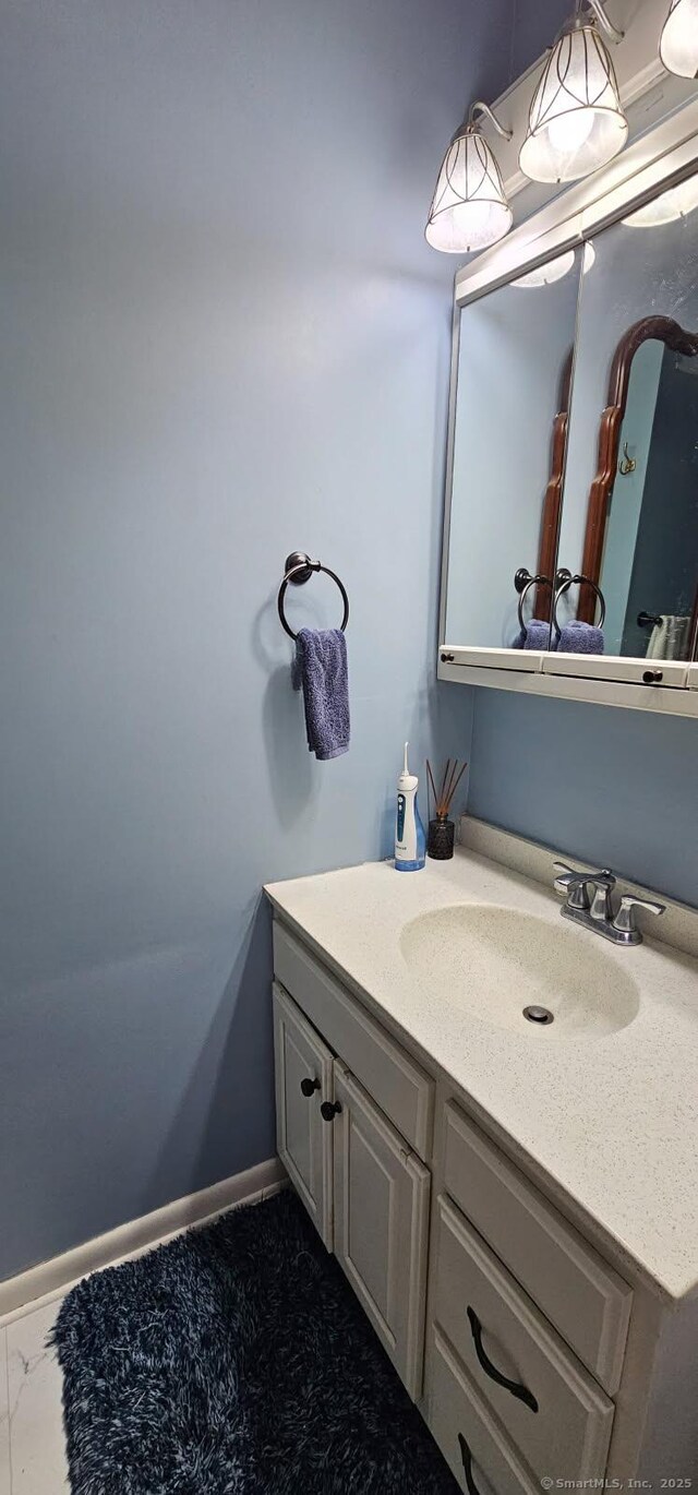 27 Ann St, West Haven, CT 06516 - bathroom with vanity and baseboards