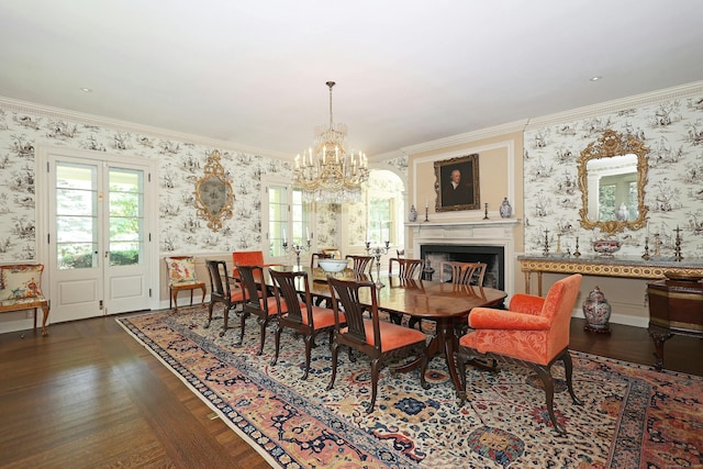 27 Country Club Rd, Ridgefield, CT 06877 - dining area with wallpapered walls, a chandelier, ornamental molding, wood finished floors, and a fireplace
