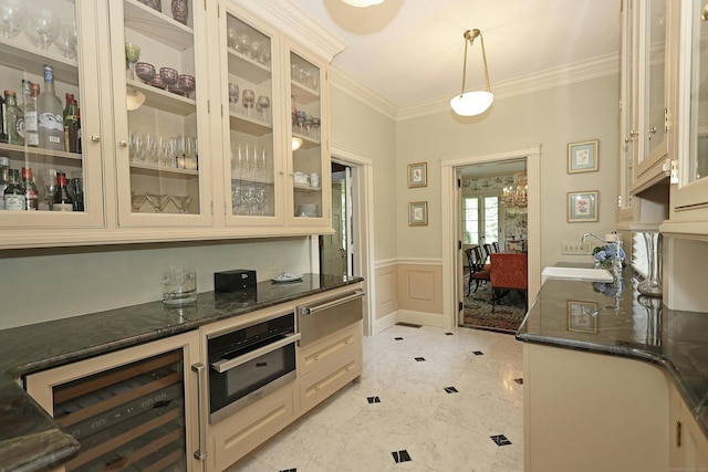 27 Country Club Rd, Ridgefield, CT 06877 - kitchen with cream cabinetry, a warming drawer, oven, crown molding, and wine cooler