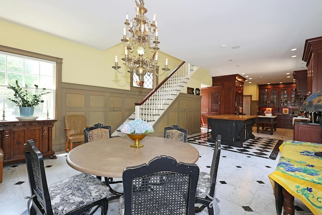 27 Country Club Rd, Ridgefield, CT 06877 - dining room featuring stairway, a chandelier, recessed lighting, and a decorative wall