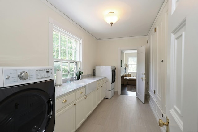 27 Country Club Rd, Ridgefield, CT 06877 - laundry area featuring healthy amount of natural light and cabinet space