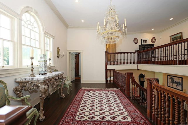 27 Country Club Rd, Ridgefield, CT 06877 - corridor featuring a chandelier, wood finished floors, ornamental molding, an upstairs landing, and baseboards